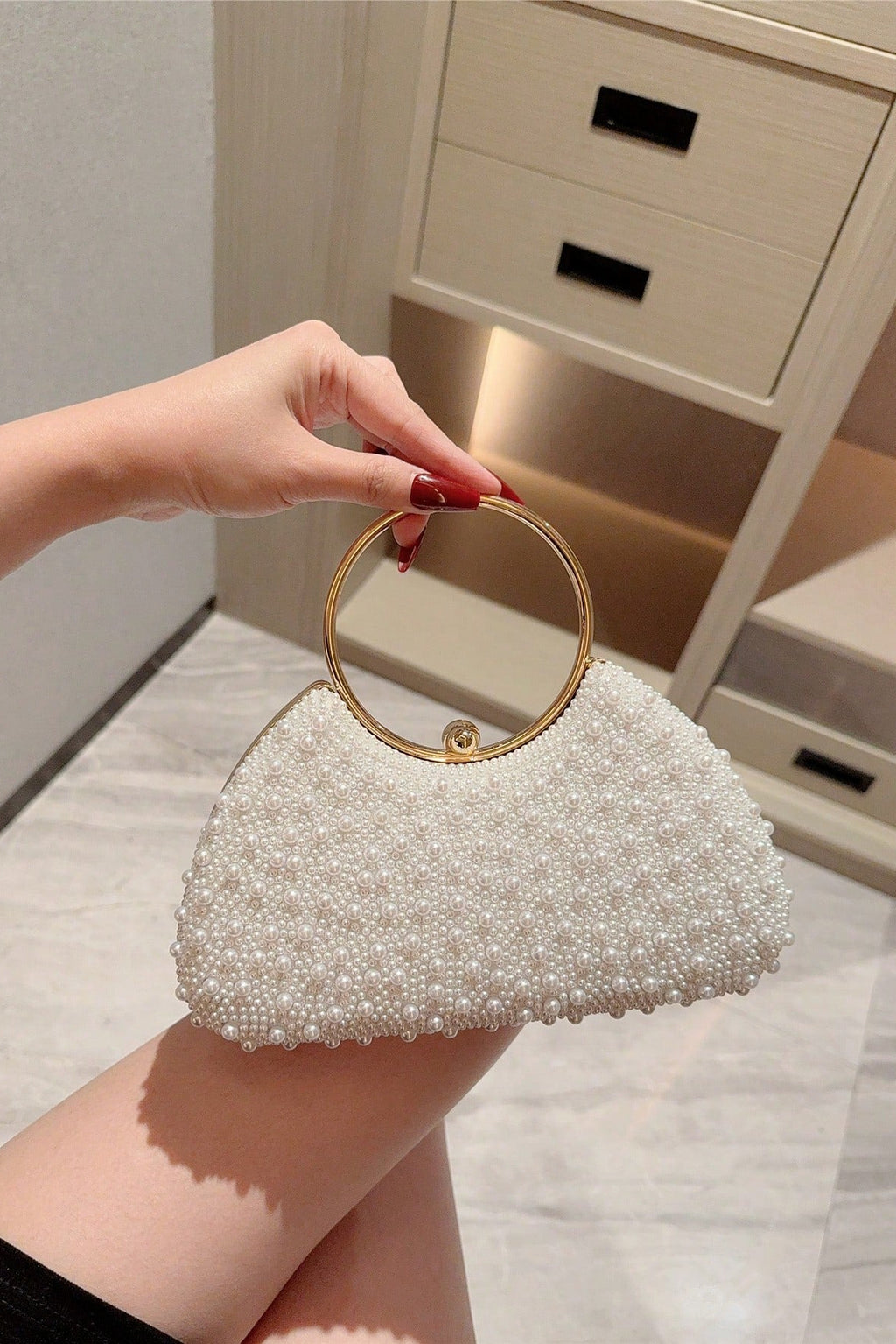 All Over White Pearl Curved Clutch with Large Gold Ring Handle