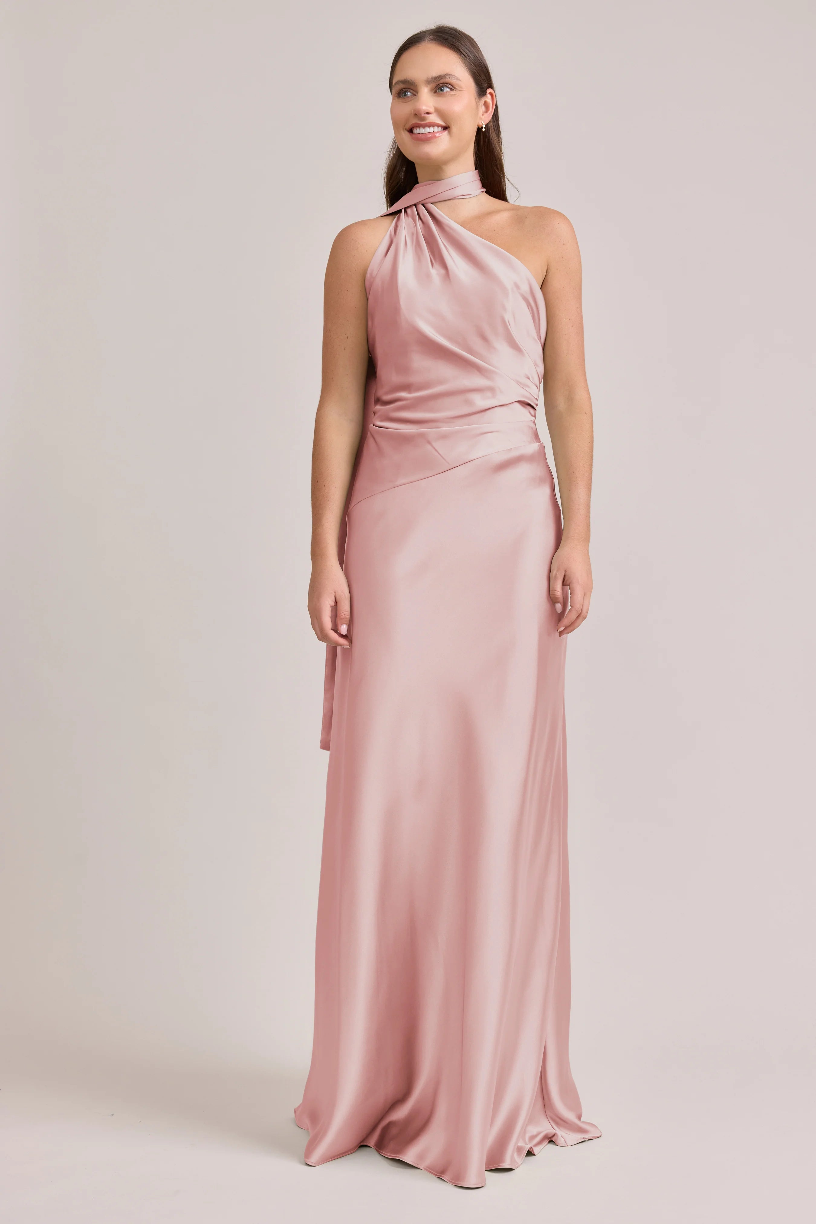 Blush Pink Halter One-shoulder Satin Bridesmaid Dresses with Ruched Waist and Flowing Back Sash