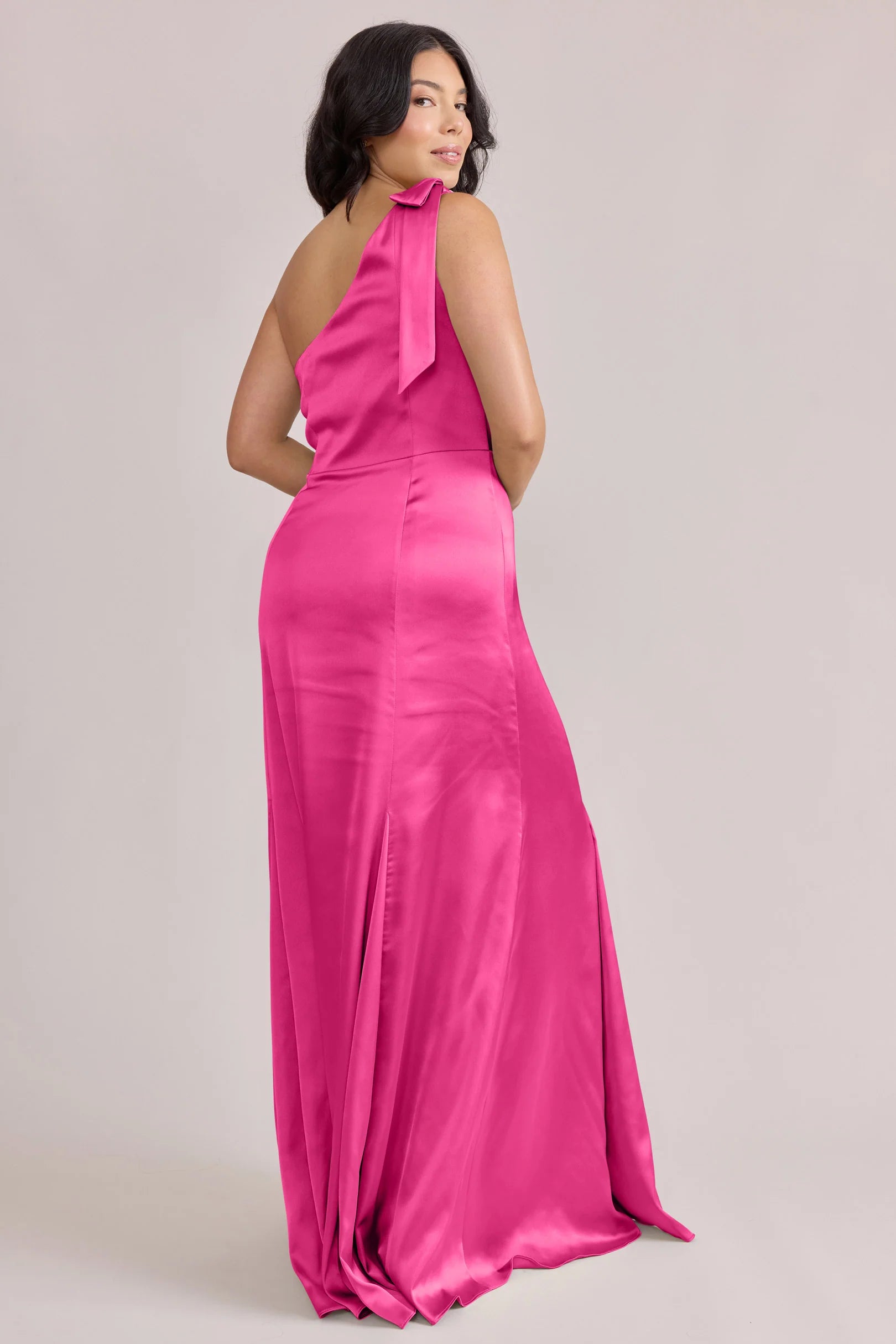Bold One-Shoulder Hot Pink Satin Bridesmaid Dress with Self-Tie Bow Detail & Flowy Mermaid Floor-Length Hem