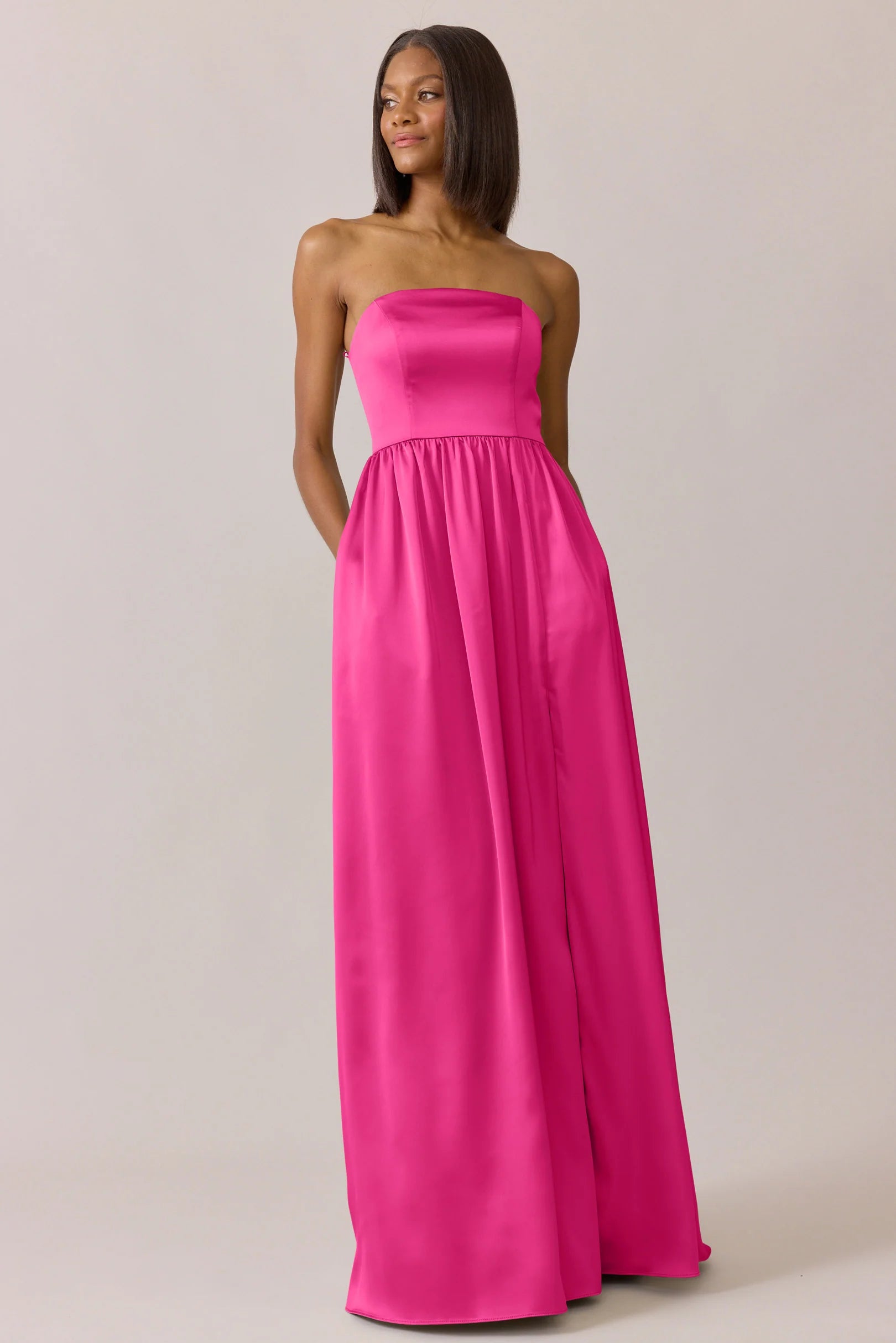 Chic Strapless Square Neck Hot Pink Satin Bridesmaid Dress with Empire Waist, Hidden Pockets & Flowy A-Line Floor-Length Hem
