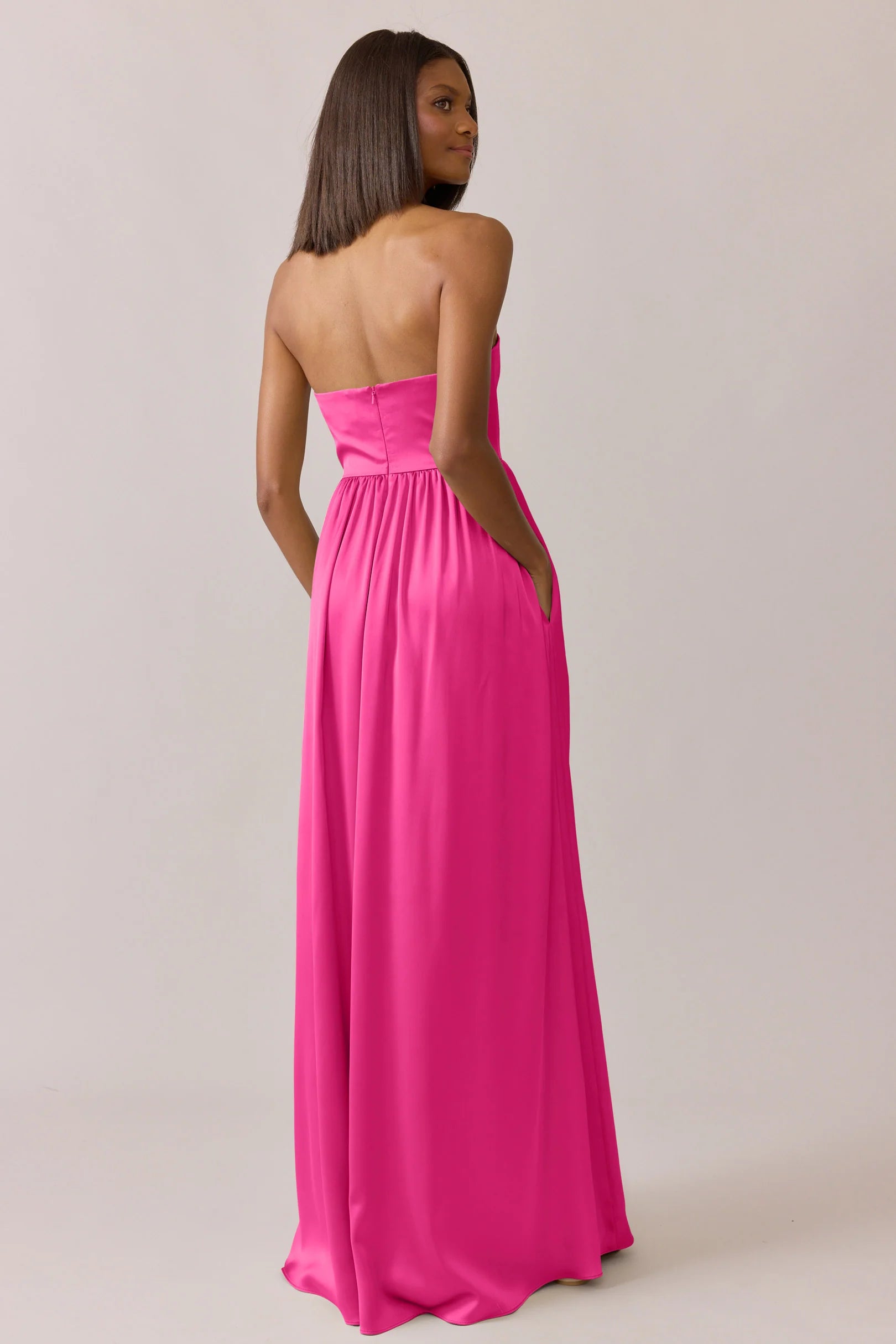 Chic Strapless Square Neck Hot Pink Satin Bridesmaid Dress with Empire Waist, Hidden Pockets & Flowy A-Line Floor-Length Hem