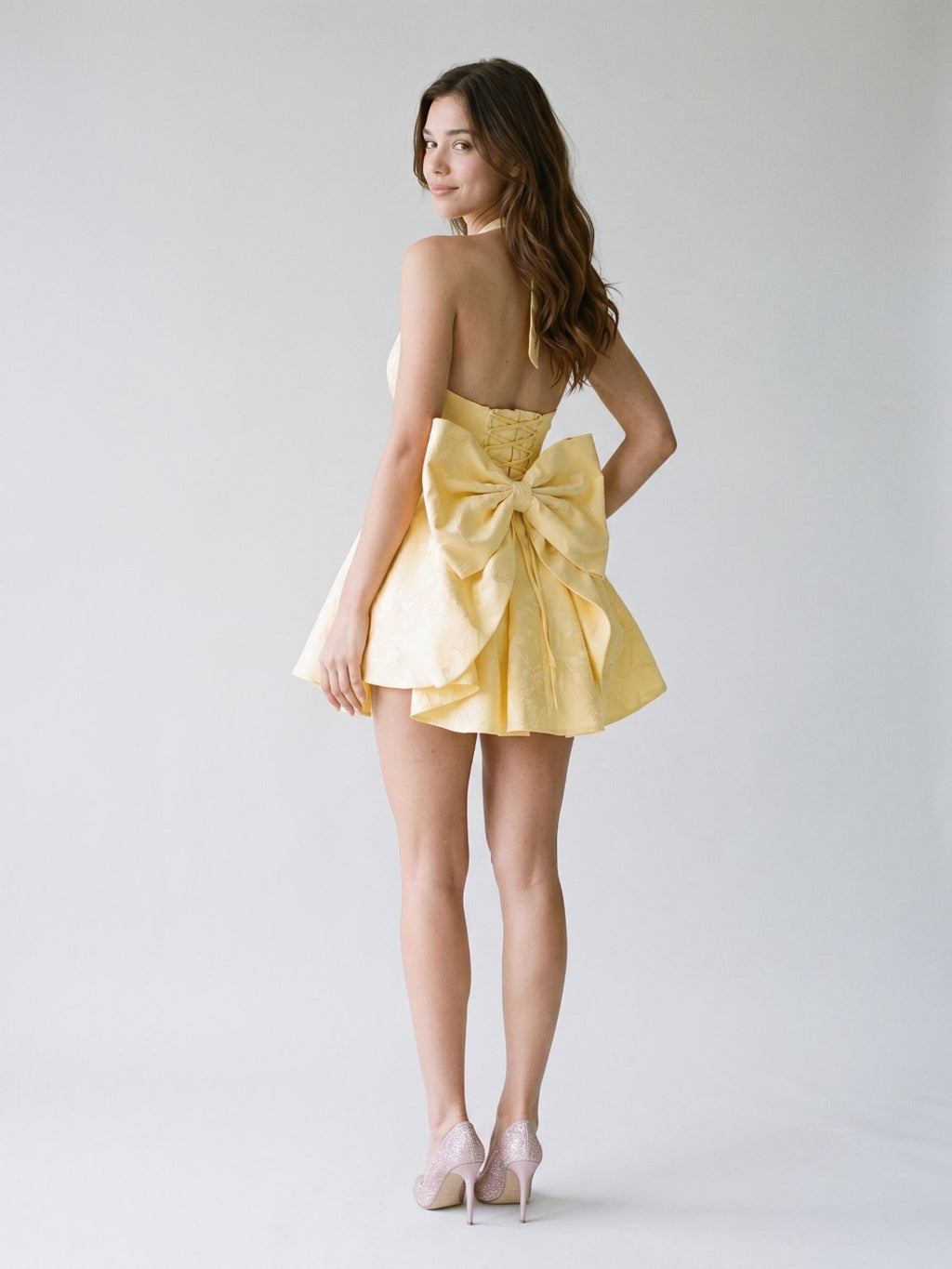 Daffodil Satin A-Line Halter Neckline Backless Short Homecoming Dress with Bow