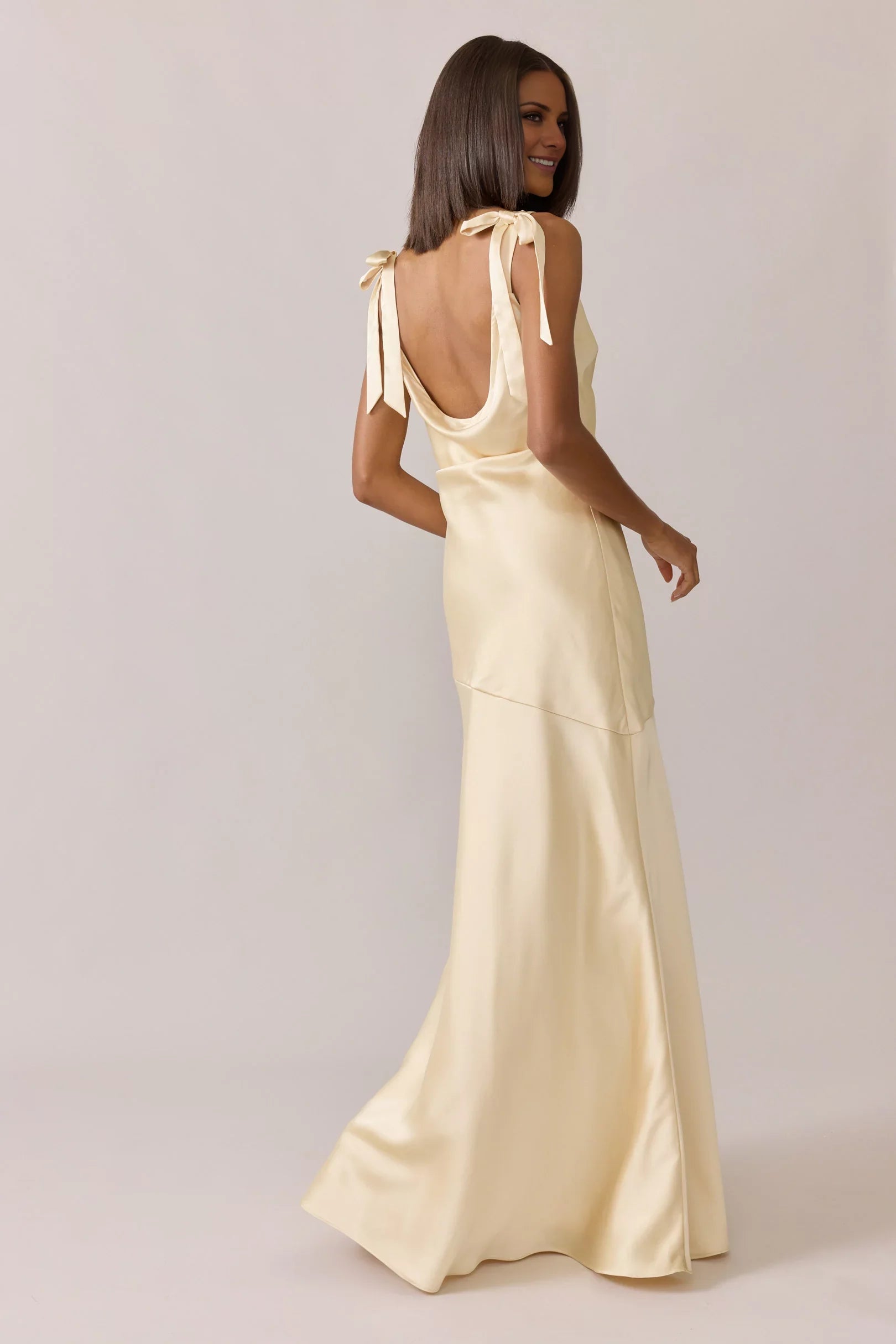 Sleek Champagne Satin Asymmetrical-Neck Tie-Back Floor-Length Bridesmaid Gown