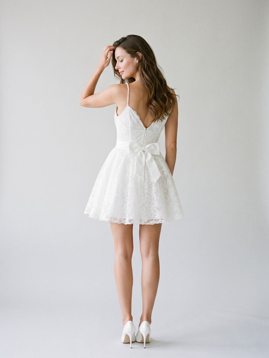 White Lace A-Line V-Neck Backless Short Homecoming Dress with Bow